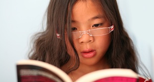 child reading glasses
